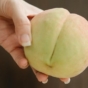Bum shaped peach