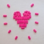 Pink pills in heart shape