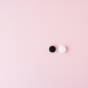 Tablets on pink background