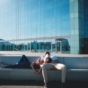 Couple relax on public bench