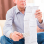 Man reading side effects leaflet